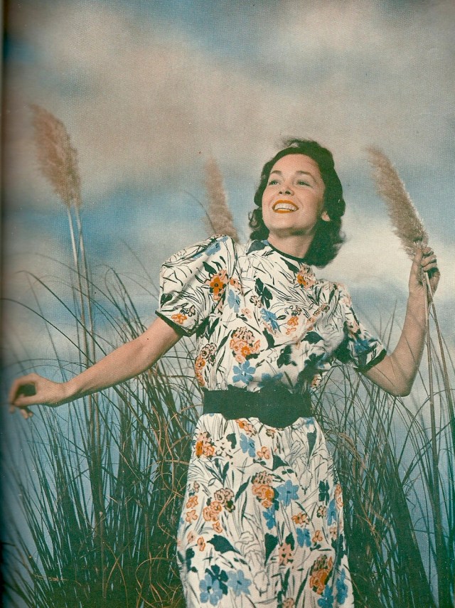 From Tarzan to 'A Day at the Races' with the mad Marxes to 'The Emperor's Candlesticks' has been the lot of Maureen O'Sullivan in the last year from Photoplay Magazine August 1937