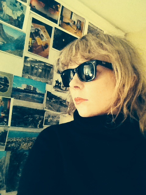 Lettie in front of her postcards