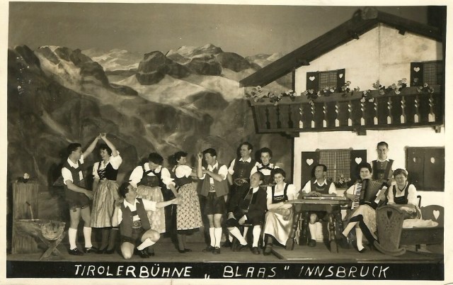 27.5.56 arrived today from Cortina D'Ampezza where the winter Olympic games were held ....On the back is a picture of a group who are giving a concert dancing and yodelling. I have bought their postcard here it is best love Dad